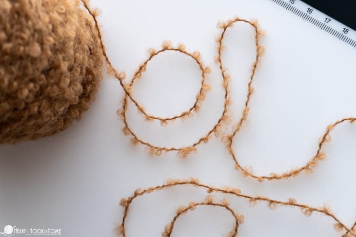 Bouclé yarn laid out 