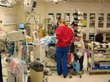 Female in a hospital room setting.