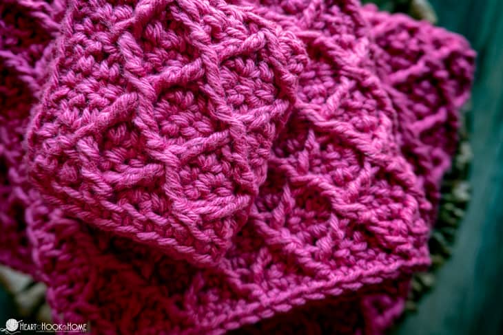 Pink colorway of the Diamond Cloth crochet pattern in three sizes.