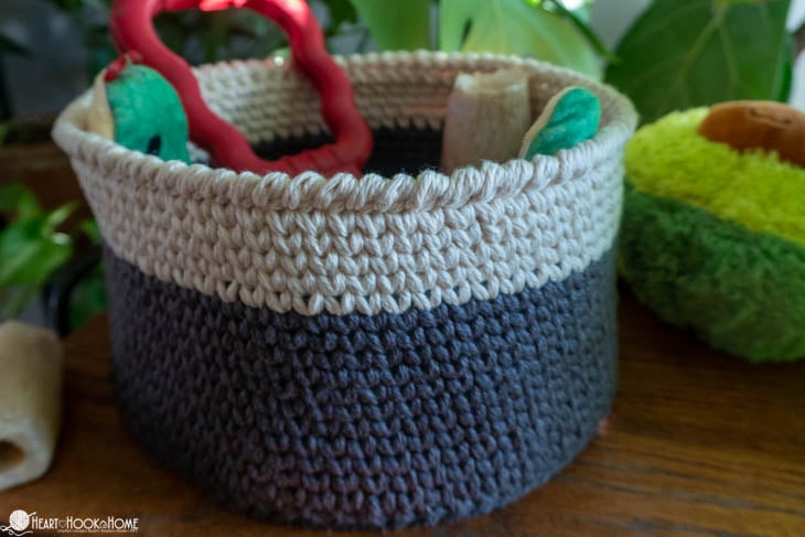Dark gray and white example of the Dog Toy Basket crochet pattern.