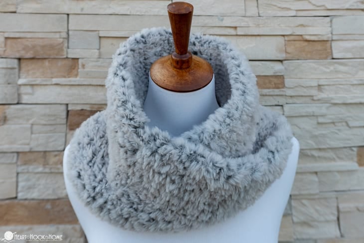 Gray colorway of the Fur Crochet Cowl Pattern on a dress form.