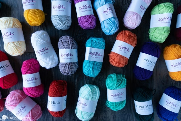 A 24-pack assortment of Brava Mini Skeins from WeCrochet in various colors.