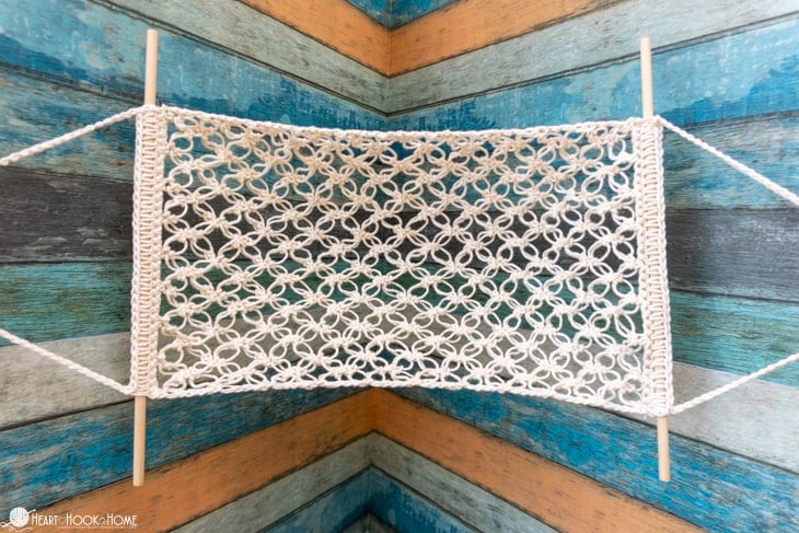 Aerial view of an example of the Fruit Hammock crochet pattern in a white colorway. 