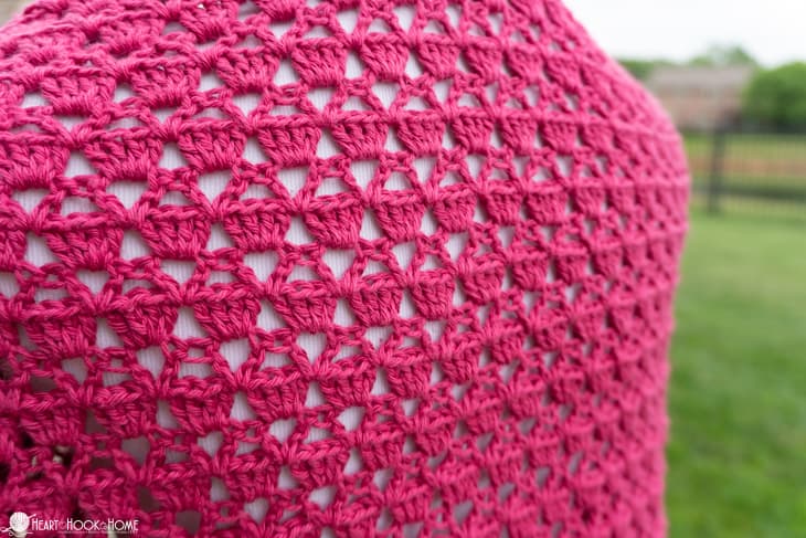 Up close sample of the Summer Sultan Cardi crochet pattern in the Cerise colorway of CotLin yarn from WeCrochet.