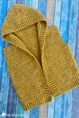 Gold example of a Layering Hooded Vest crochet pattern.